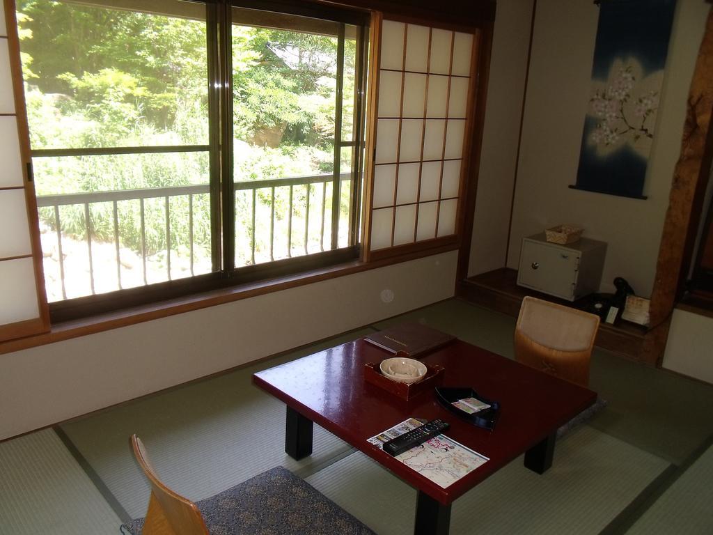 Takaragawa Onsen Ousenkaku Hotel Минаками Екстериор снимка